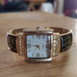 Elegant Gold and Black Women's Watch